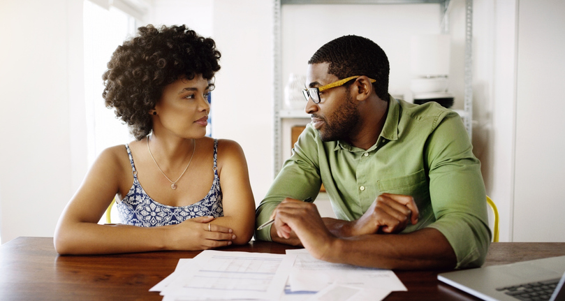 A couple creating a retirement plan.