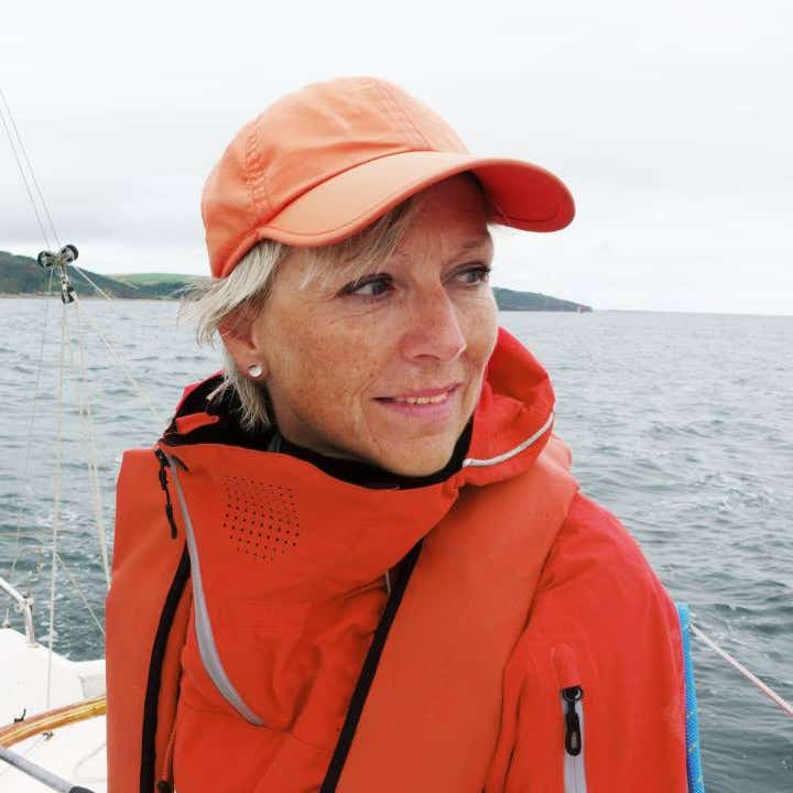 Mature lady on sailing boat